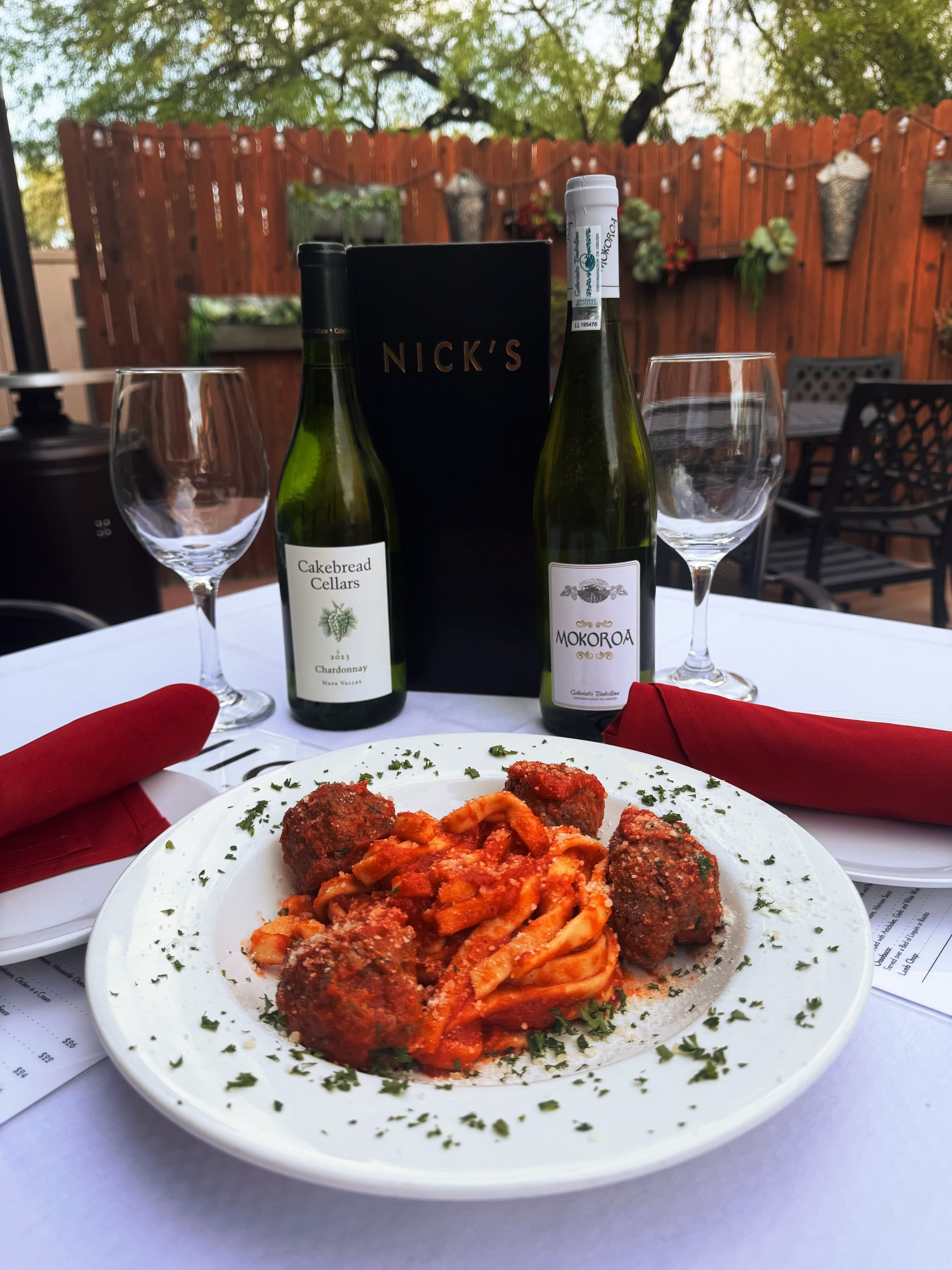 Pasta with meatballs paired with wine on the Nick's patio.